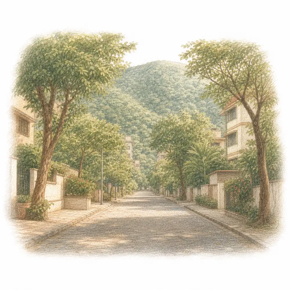 Tree-lined Mulund street and green hills, marking the local door to Weave