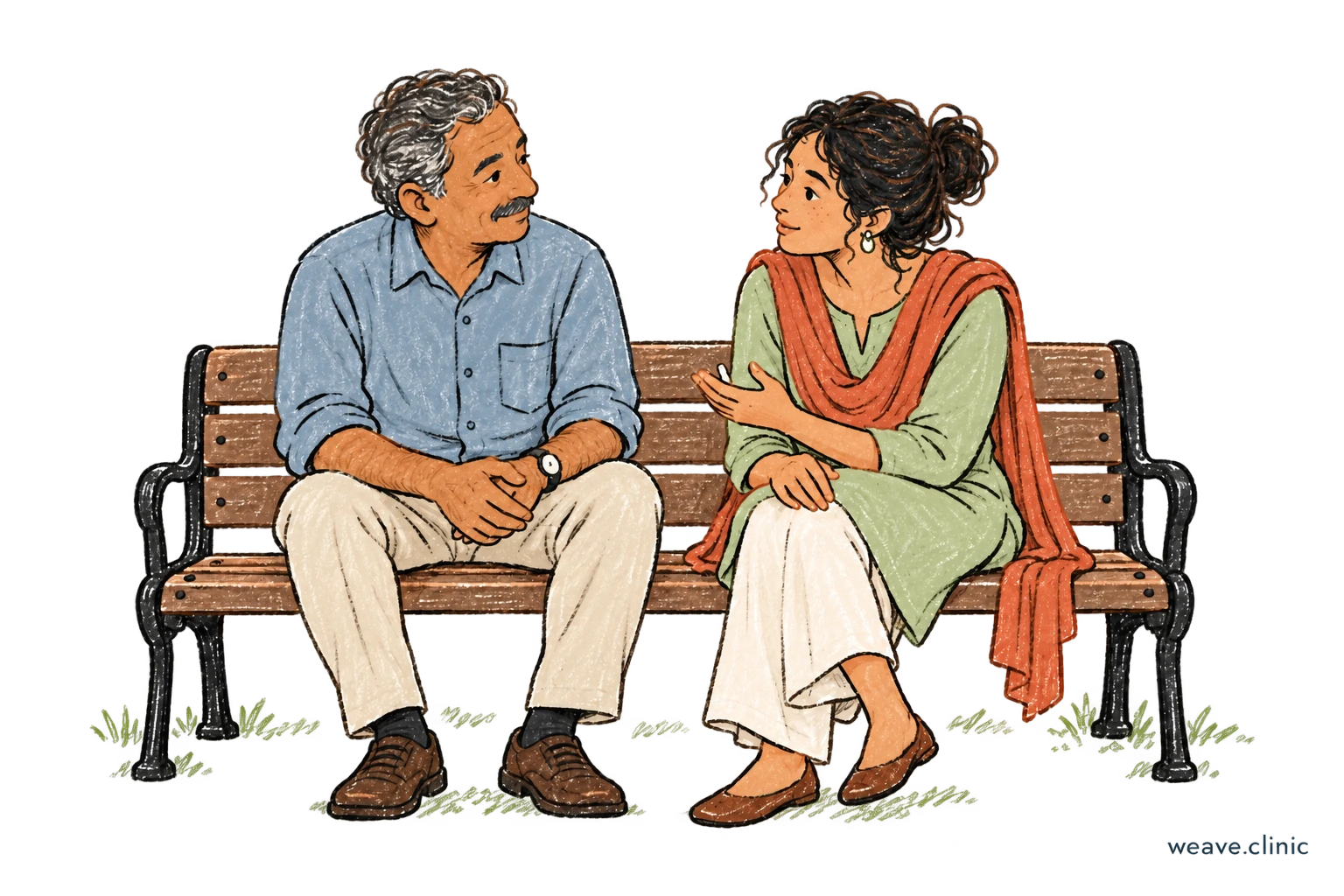 An older man and a younger woman talking on a bench.
